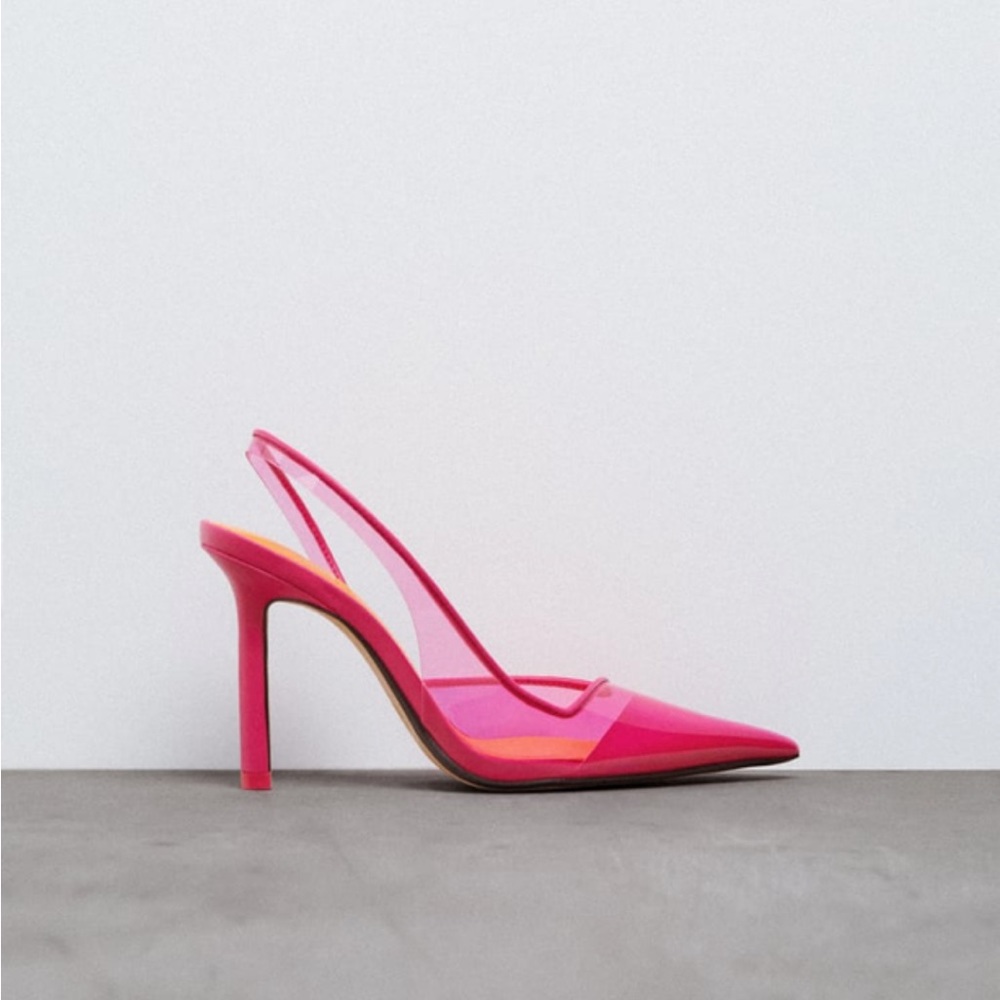 Beautiful Brand New Fuschia colored Vinyl Heels with tags.